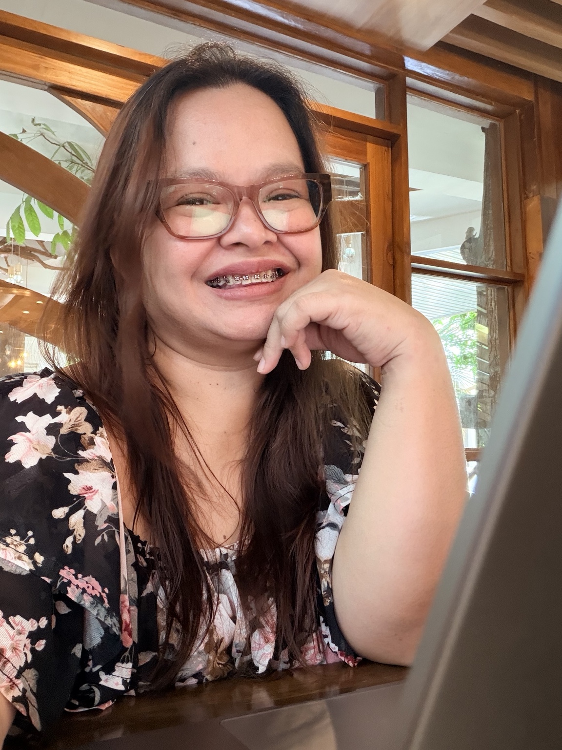 A candid photo of Rey smiling